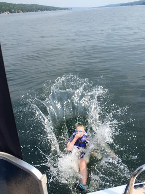 Julia taking a plunge in the middle of the lake