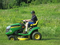 Nathan mowing